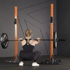 Mirafit M3 Squat Stands 12 Mirafit M3 Squat Stands -Fitness Promotion Store Front Squat using Orange Mirafit M3 Squat Stand 1