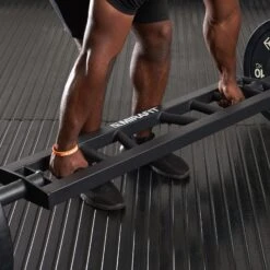 Mirafit Multi Grip Olympic Swiss Bar - Black -Fitness Promotion Store Man Gripping a Mirafit Black Olympic Swiss Bar