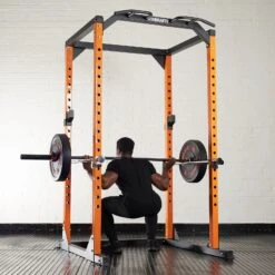 Mirafit Power Rack Spotter Bars -Fitness Promotion Store Man Performing Squats in Cage with Mirafit 60mm Spotter Bars