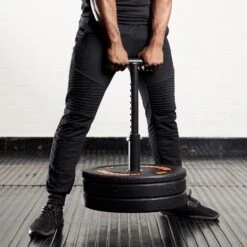 Mirafit Olympic Plate Loading Pin T Handle -Fitness Promotion Store Man Performing a Deadlift with a Mirafit Loading Pin Power Handle Fully Extended