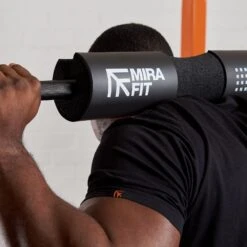Mirafit Barbell Squat Pad -Fitness Promotion Store Man Performing a Squat with a Black Mirafit Barbell Squat Pad Close Up View