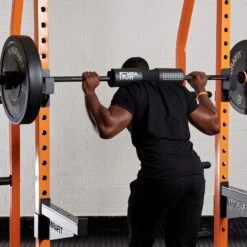 Mirafit Barbell Squat Pad -Fitness Promotion Store Man Performing a Squat with a Black Mirafit Barbell Squat Pad 1