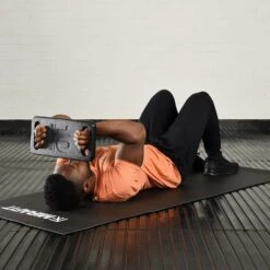 Mirafit Cast Iron Ruck Plates -Fitness Promotion Store Man Using Mirafit Cast Iron Ruck Plate for Skull Crushers 5