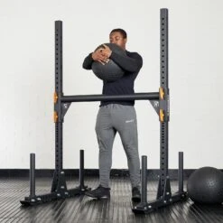 Mirafit Strongman Training Ball -Fitness Promotion Store Man Using Mirafit Strongman Training Ball as Atlas Stone