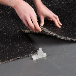 Mirafit Premium 20mm Rubber Gym Floor Mats -Fitness Promotion Store Mirafit 20mm Rubber Flooring Grey being installed