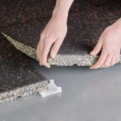 Mirafit Premium 40mm Rubber Gym Floor Mats -Fitness Promotion Store Mirafit 40mm Premium Rubber Tiles Orange being installed