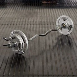 Mirafit Olympic Curl Bar & 20kg Tri Grip Weight Set -Fitness Promotion Store Mirafit Olympic Curl Bar and 20kg Tri Grip Weight on Gym Mats