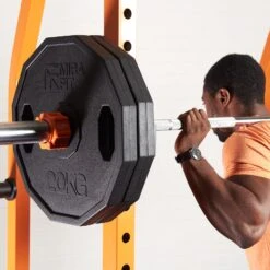 Mirafit Hex Olympic Weight Plates -Fitness Promotion Store Squatting with Mirafit Hex Olympic Weight Plates