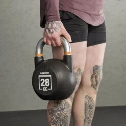 Mirafit Urethane Competition Kettlebells -Fitness Promotion Store holding Mirafit Urethane 28kg Kettlebell 1