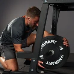 Mirafit M4 Reverse Hyper -Fitness Promotion Store loading plates on Mirafit Reverse Hyper 1