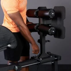 Mirafit GHD Machine -Fitness Promotion Store man adjusting foot pad Mirafit GHD Machine 1