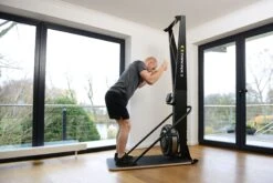 Concept2 SkiErg Floor Stand -Fitness Promotion Store man using Concept2 SkiErg 01