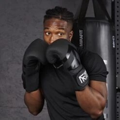 Mirafit Leather Boxing Gloves -Fitness Promotion Store man using Mirafit Leather Boxing Gloves