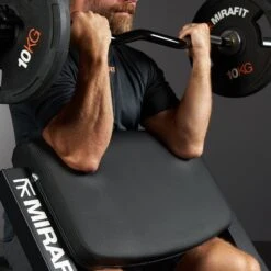 Mirafit M3 Preacher Curl Bench -Fitness Promotion Store man using Mirafit Preacher Curl 1