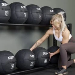 Mirafit Large 14" Slam Ball -Fitness Promotion Store picking a Mirafit Oversized Slam Ball