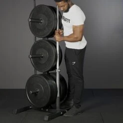 Mirafit Olympic Weight Tree With Bar Stand -Fitness Promotion Store removing barbell from mirafit weight and bar storage stand 1