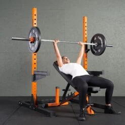 Mirafit M220 Squat Rack -Fitness Promotion Store woman doing an incline bench press in an orange Mirafit M220 Squat Rack
