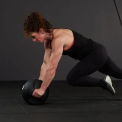 Mirafit Medicine Ball With Handles -Fitness Promotion Store woman doing mountain climber with Mirafit Double Handle Medicine Ball