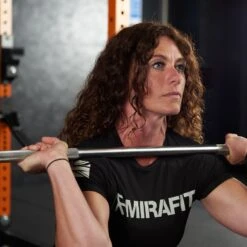 Mirafit Women's Gym T-Shirt 13 Mirafit Women's Gym T-Shirt -Fitness Promotion Store woman exercising wearing Mirafit Womens Gym T Shirt 5