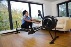 Concept2 RowErg Rower With PM5 Monitor -Fitness Promotion Store woman using Concept2 RowERG Rower Standard PM5 03