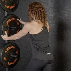 Mirafit Women's Loose-Fit Exercise Vest - Black 15 Mirafit Women's Loose-Fit Exercise Vest - Black -Fitness Promotion Store woman wearing Mirafit Womens Loose Fit Exercise Vest in gym 8